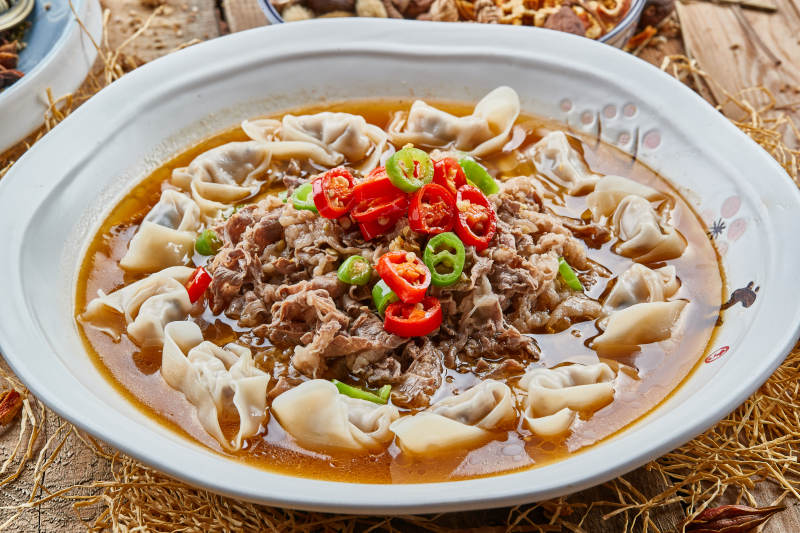 酸汤肥羊盖云吞图片