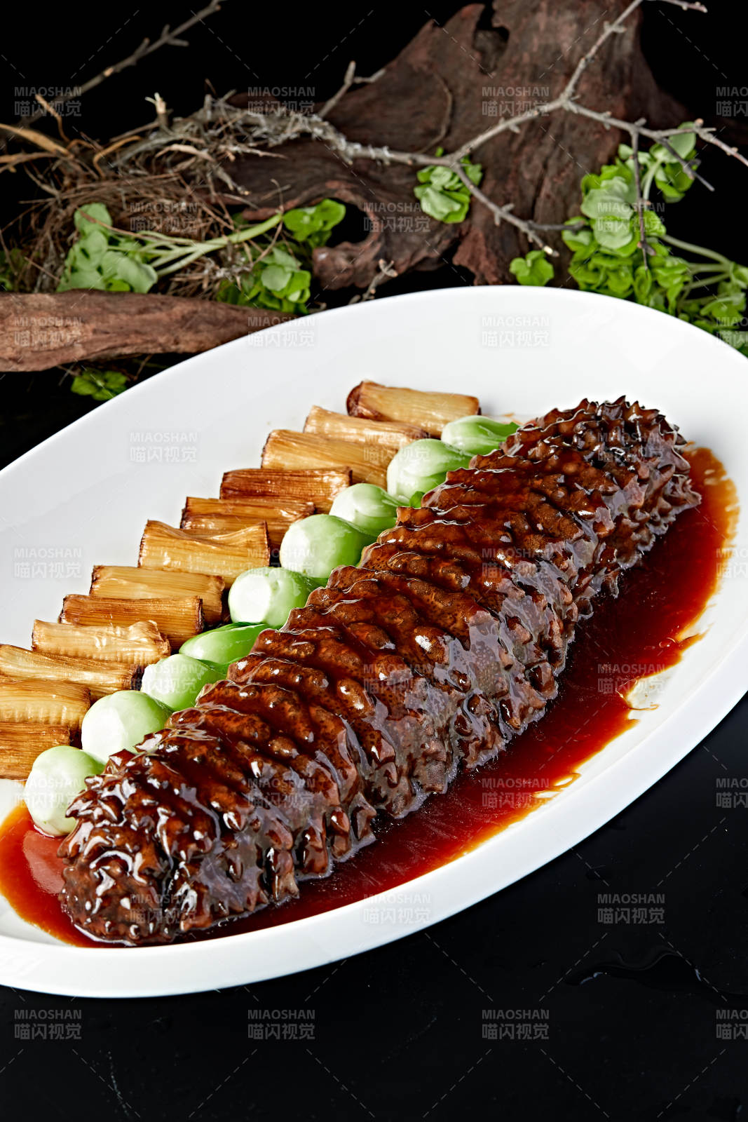 鲁菜葱烧浇汁寿桃梅花参图片