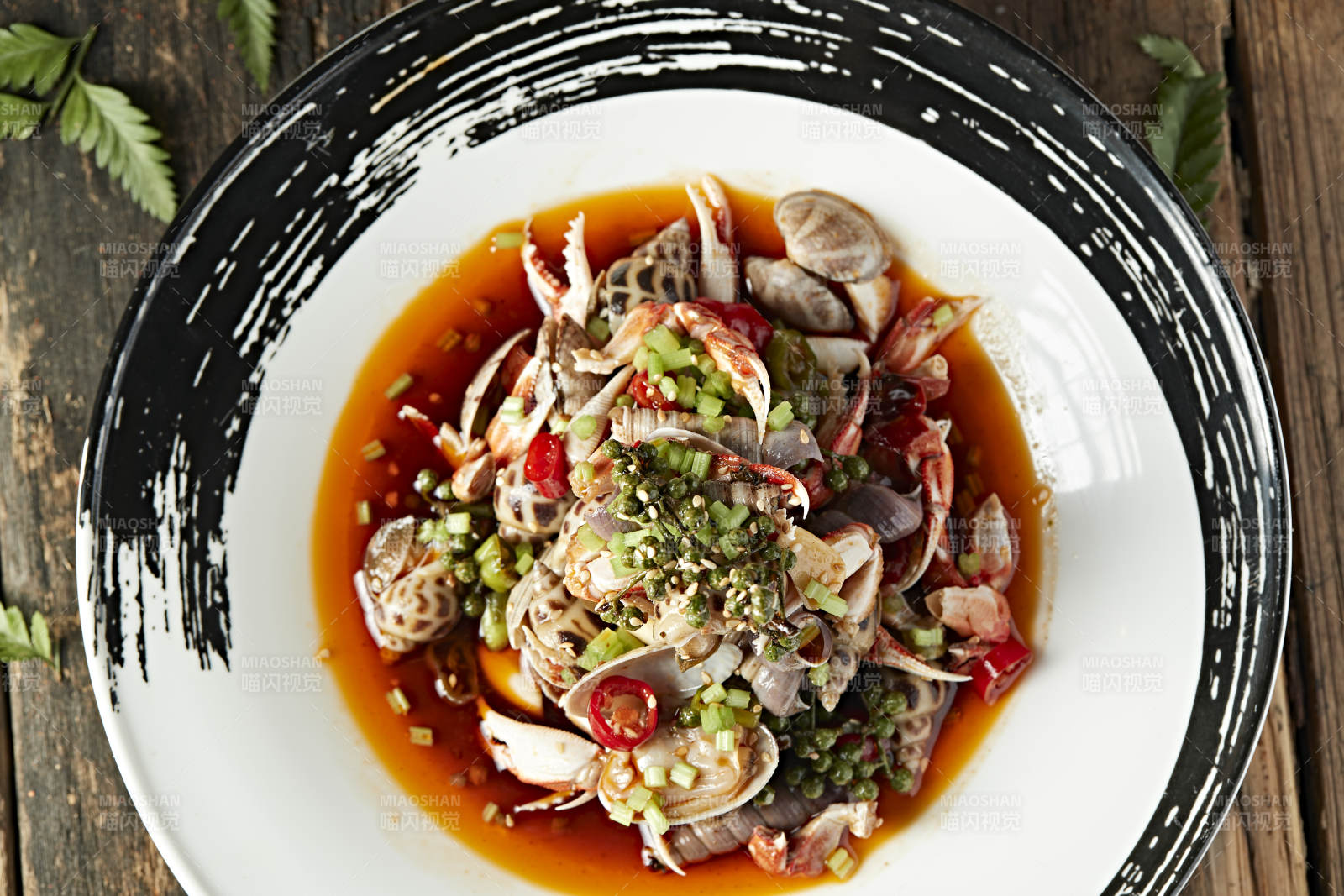 藤椒红油腌渍小海鲜图片