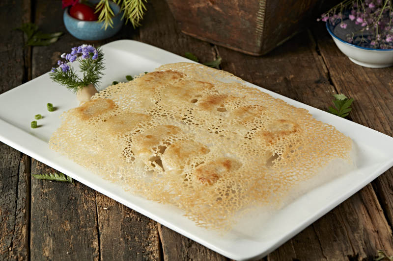 渔网酥脆煎饺图片