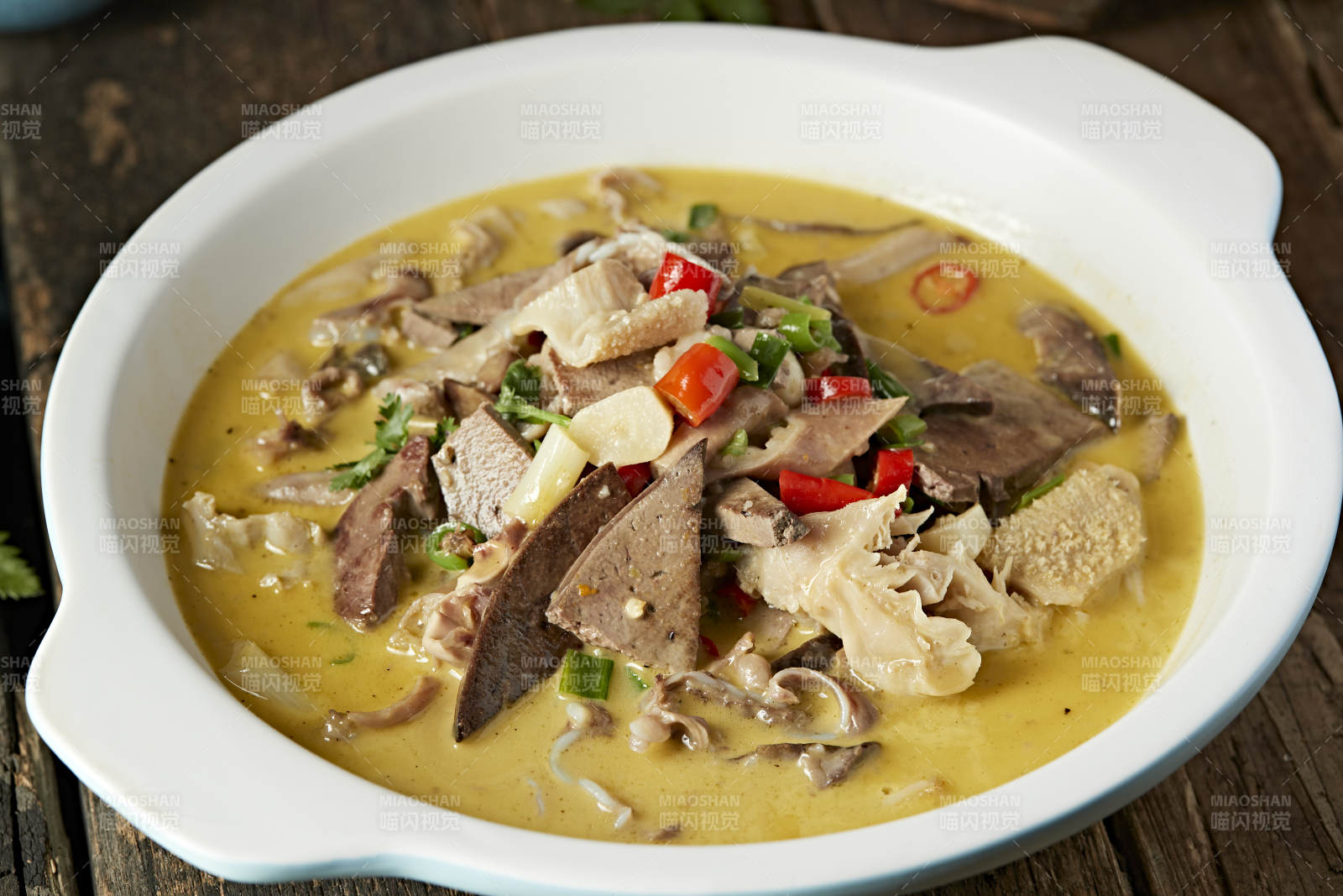 酸汤砂锅羊杂碎图片