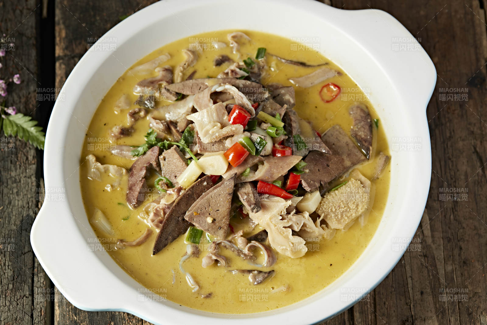 酸汤砂锅羊杂碎图片