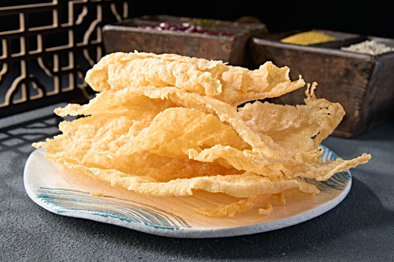 油炸响铃卷皮炸油豆皮图片