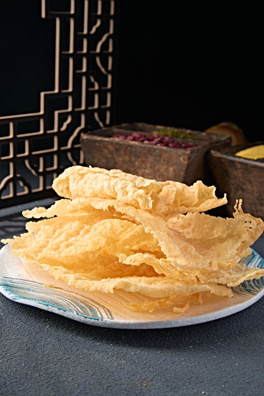 油炸响铃卷皮炸油豆皮图片