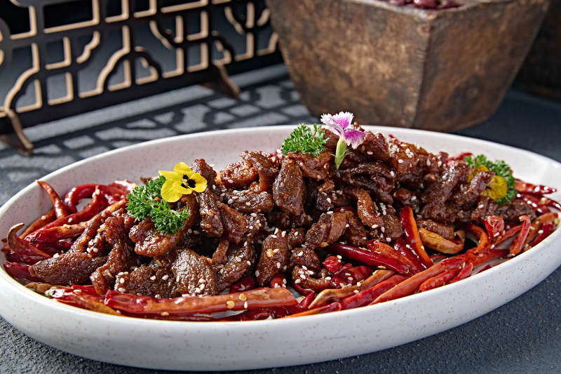 川香辣爆牛柳图片