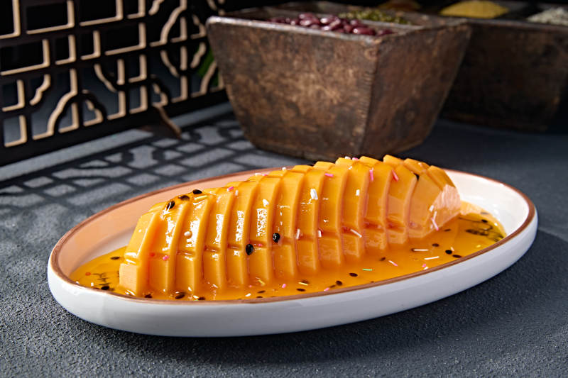 凉菜百香果汁腌木瓜片图片