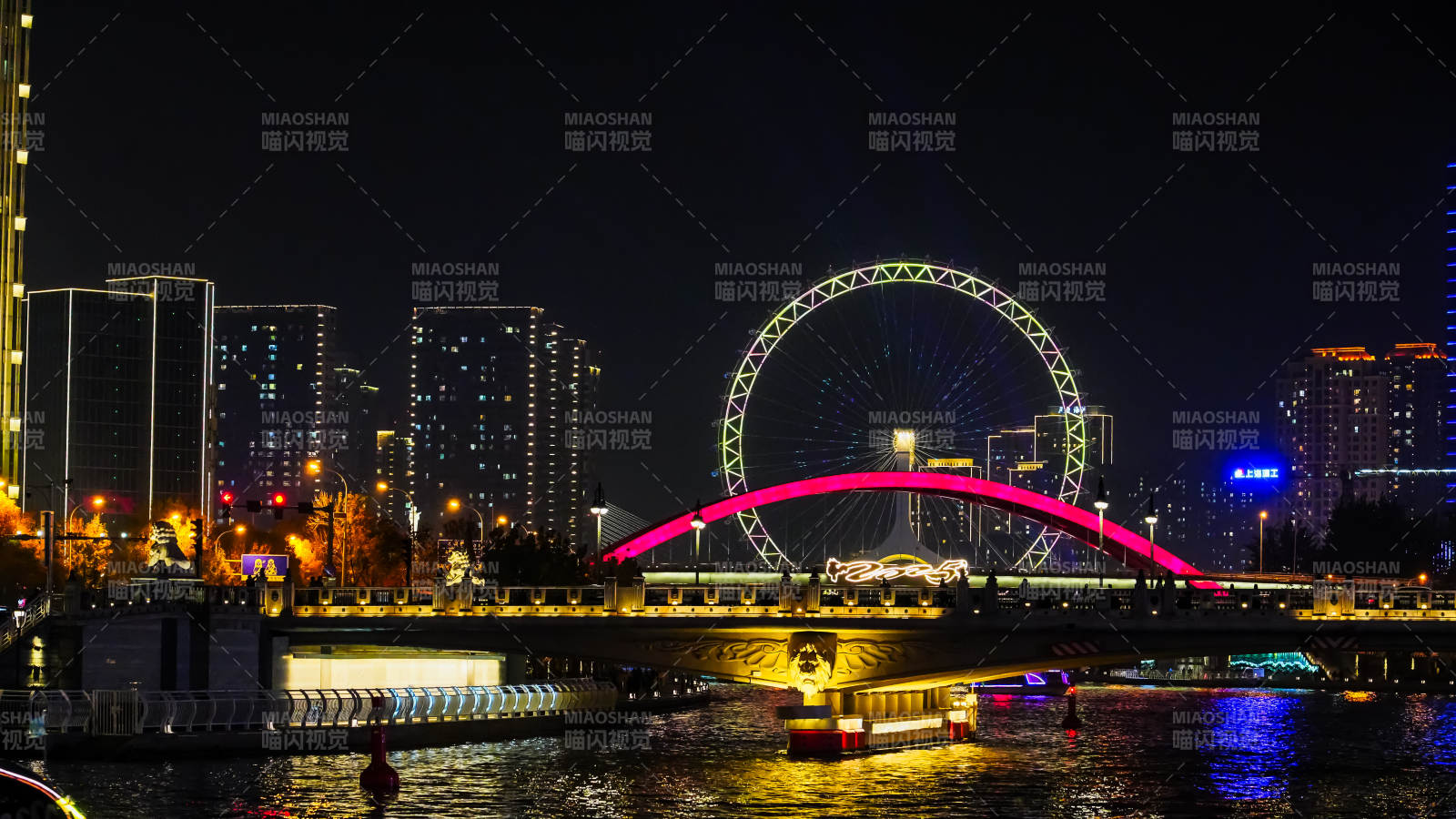 天津夜景摩天轮与桥图片