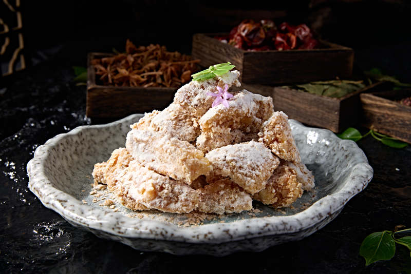 中餐美食糖霜麦片焗红薯块图片