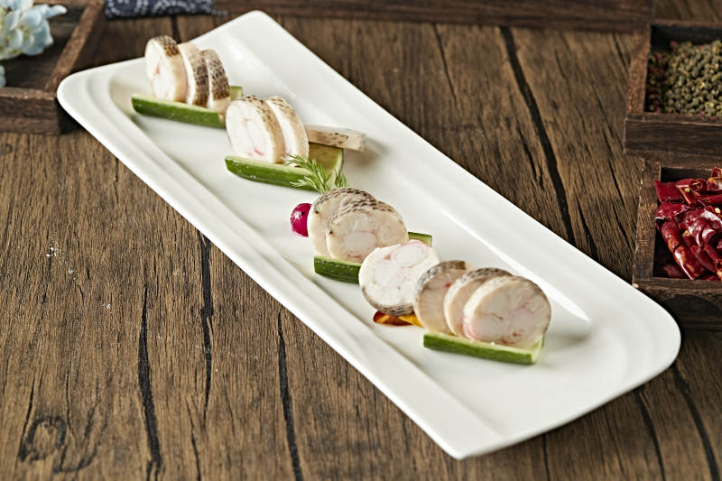 鳕鱼卷包蟹腿肉切片图片