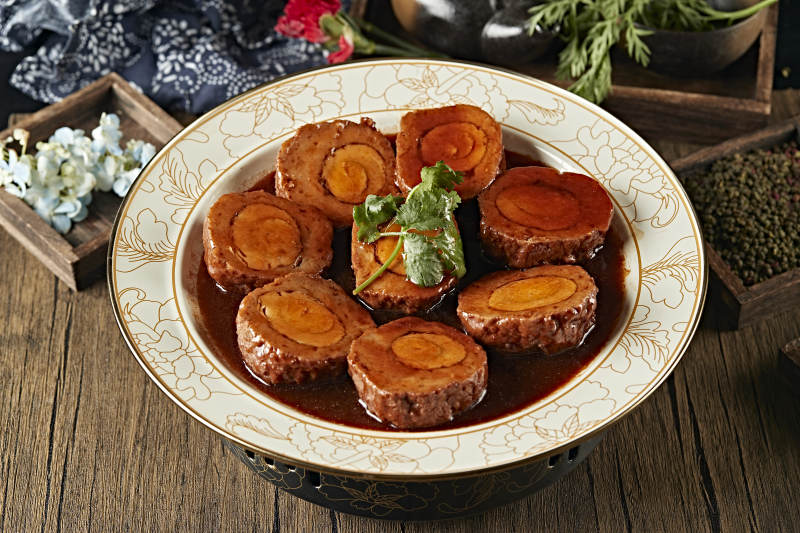 浇汁红烧凤眼丸子图片