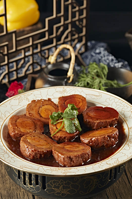 浇汁红烧凤眼丸子图片