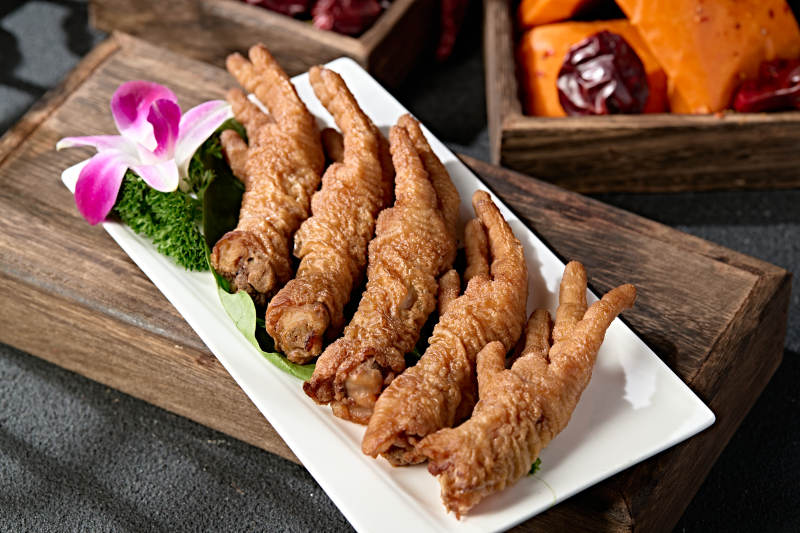 火锅食材涮虎皮鸡爪图片