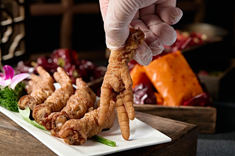 火锅食材涮虎皮鸡爪图片