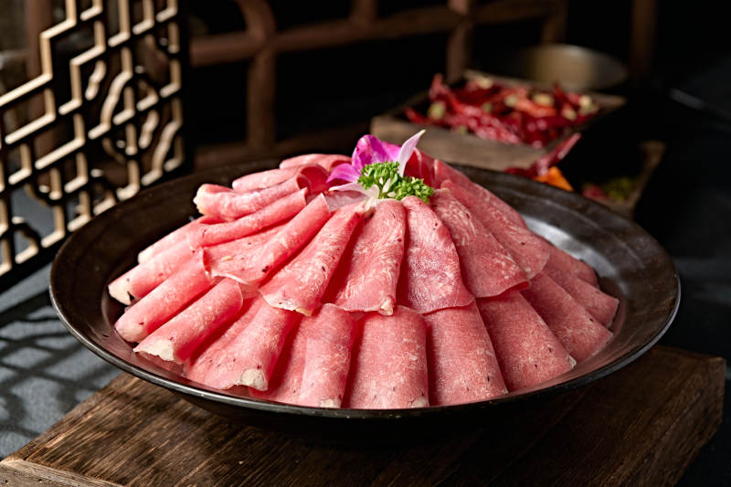 火锅食材涮牛舌卷切片图片