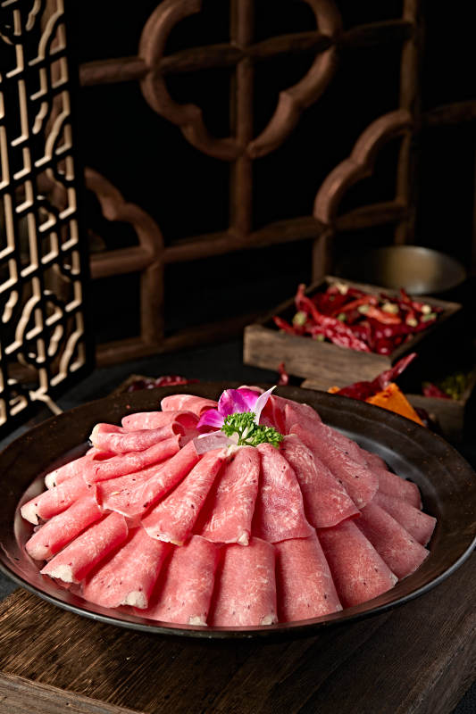 火锅食材涮牛舌卷切片图片
