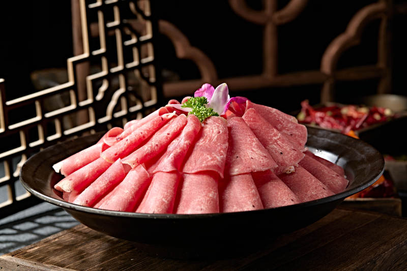 火锅食材涮牛舌卷切片图片