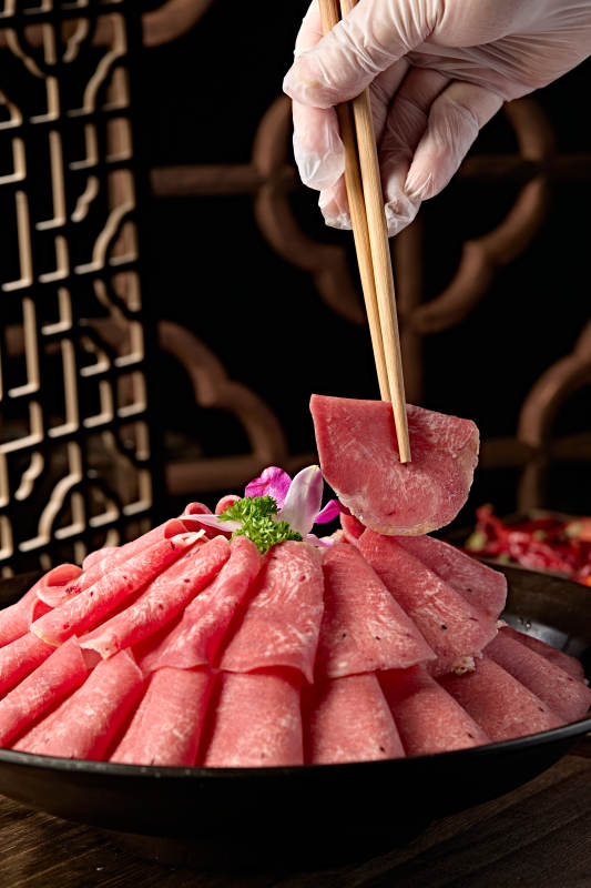 火锅食材涮牛舌卷切片图片