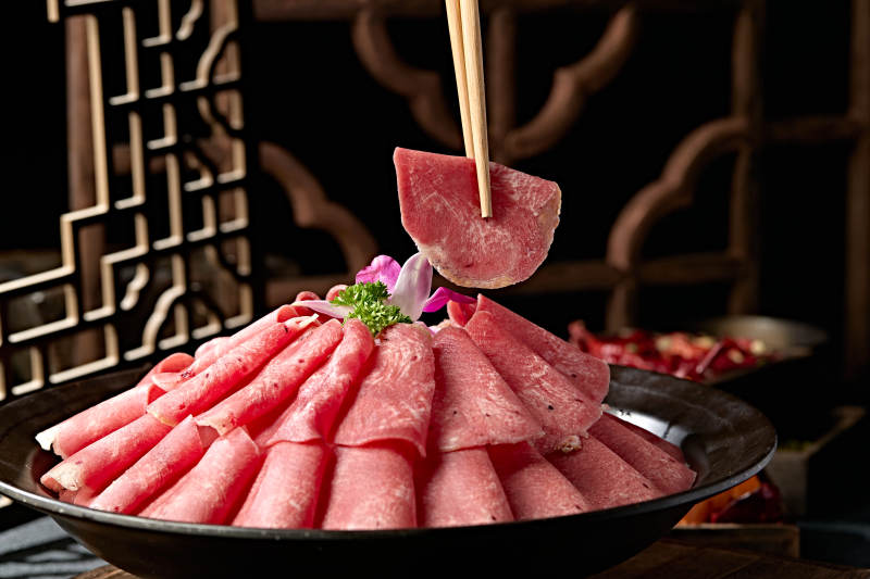 火锅食材涮牛舌卷切片图片