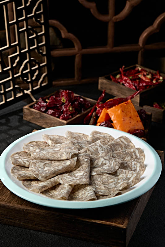 川渝火锅涮品乌鸡肉卷切片图片