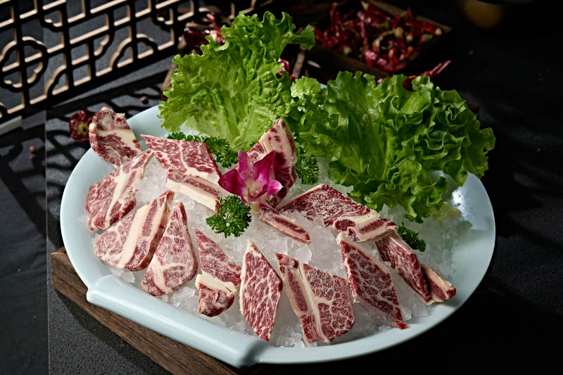 火锅涮肉食材雪花牛仔骨图片