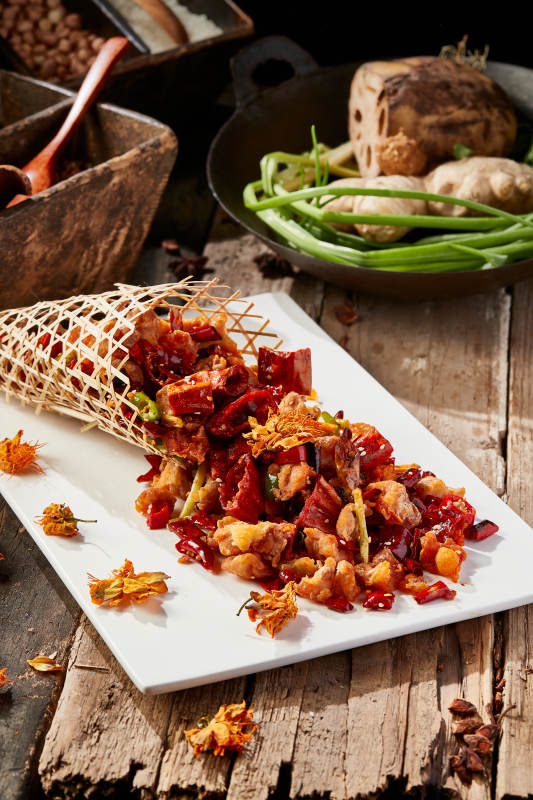 金莲花竹楼辣炒鸡脆骨图片