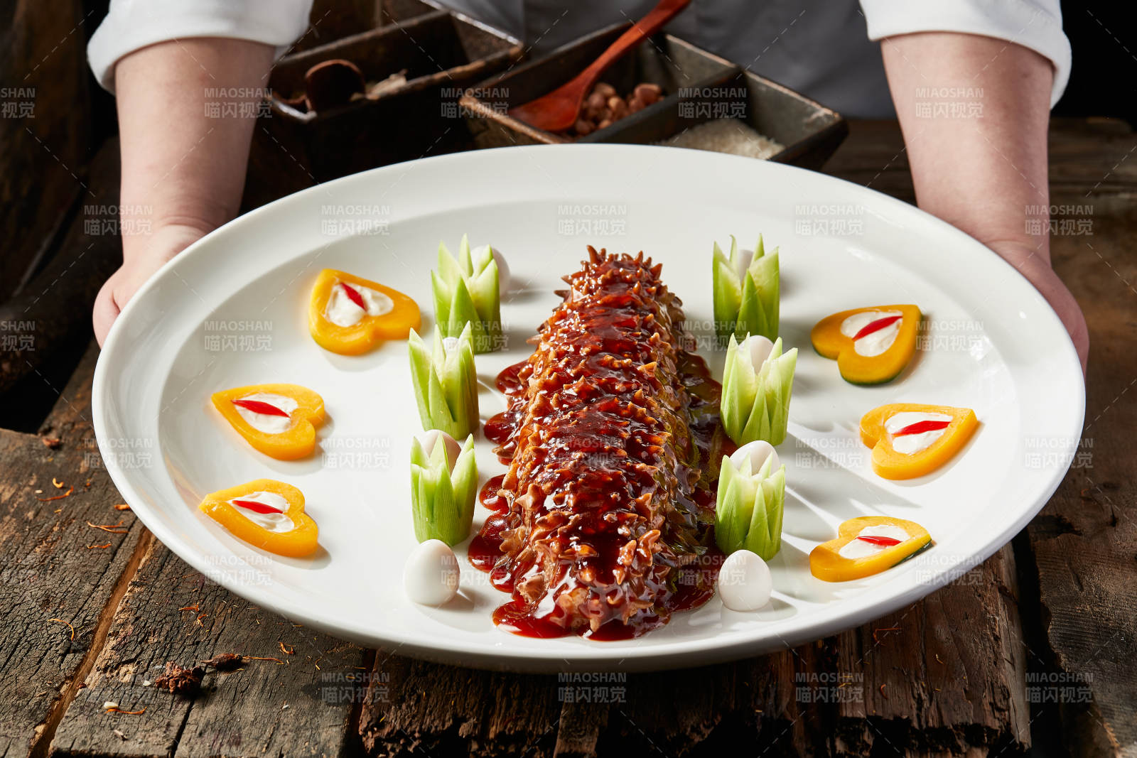 浇汁红烧寿桃梅花参图片