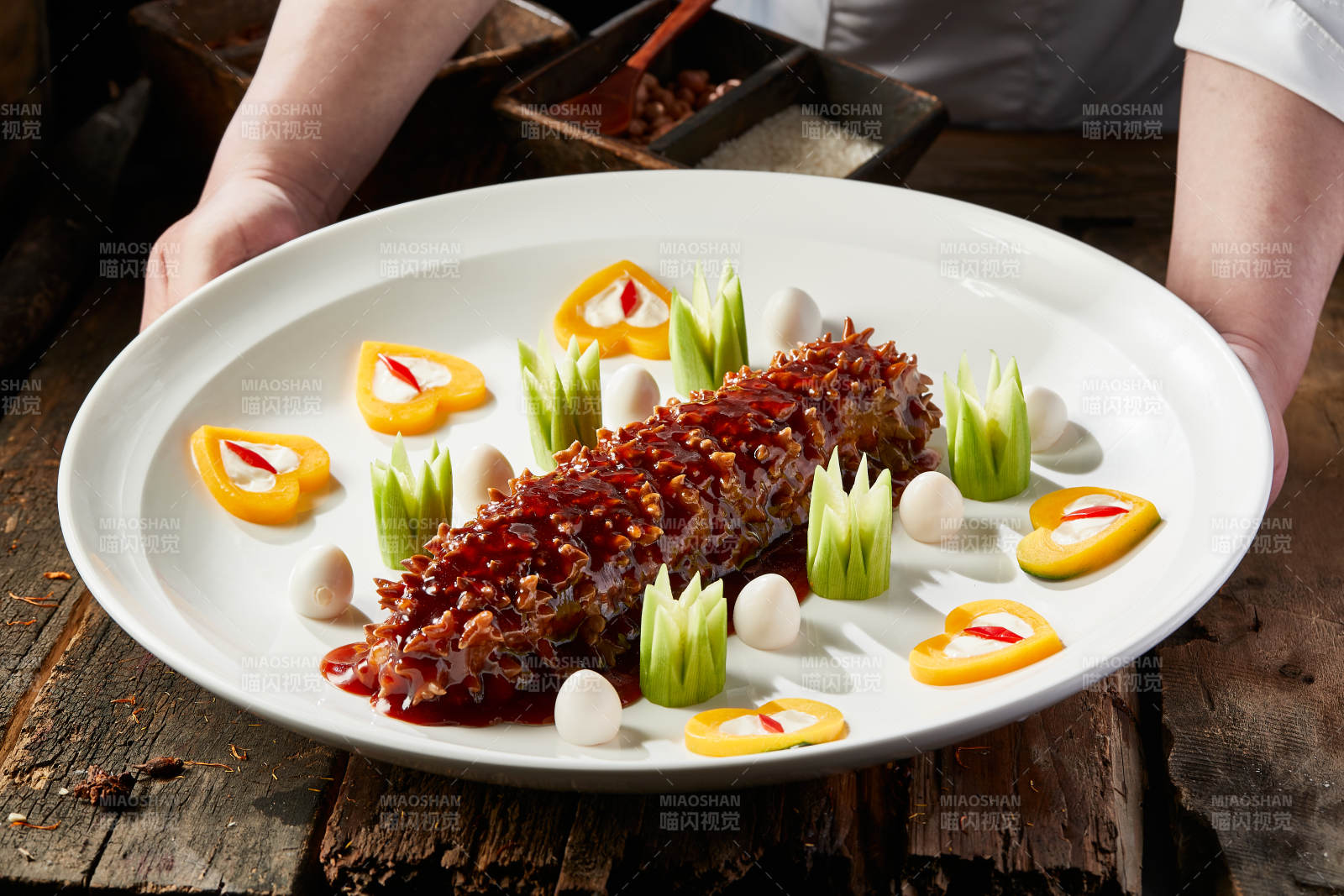 浇汁红烧寿桃梅花参图片