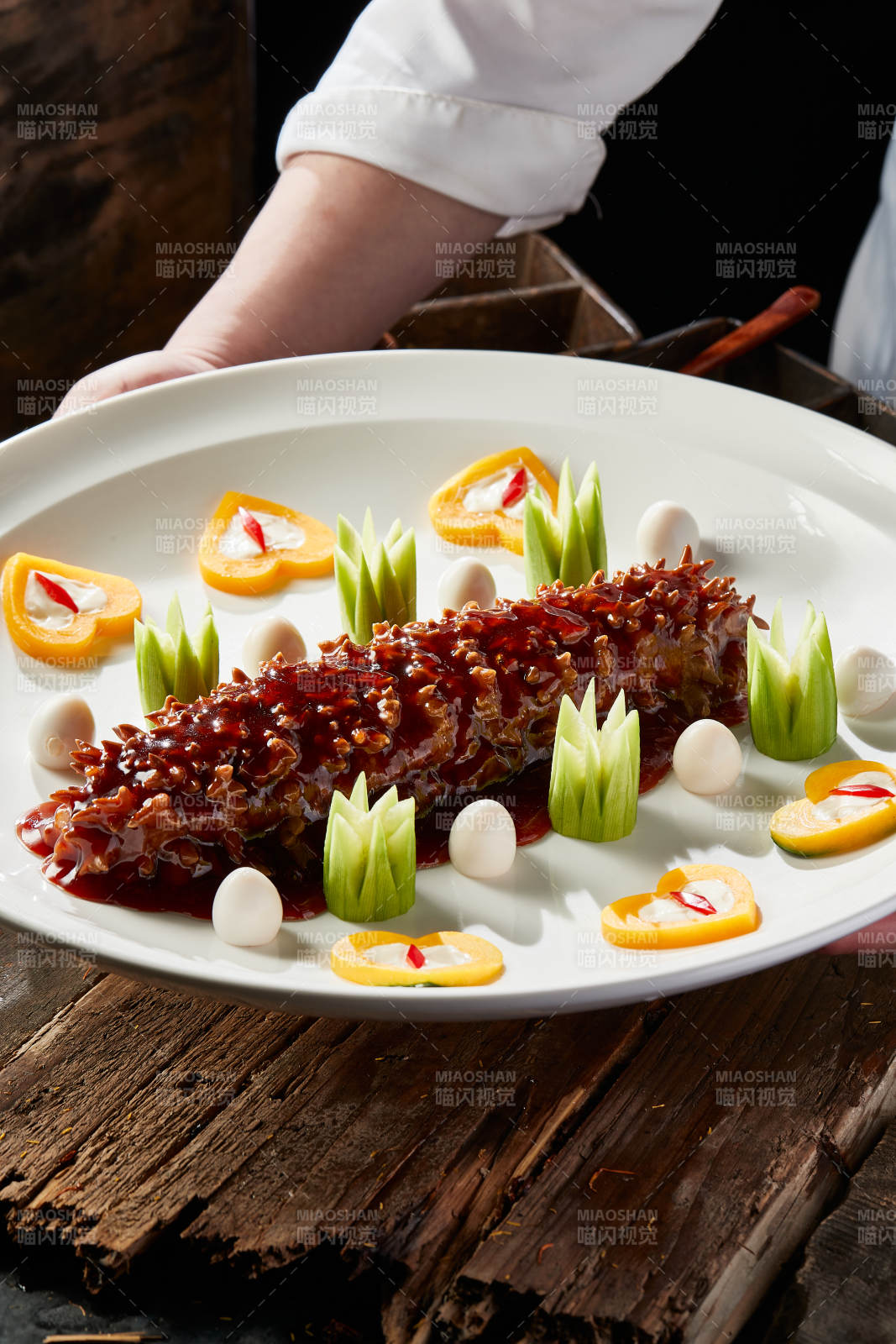 浇汁红烧寿桃梅花参图片