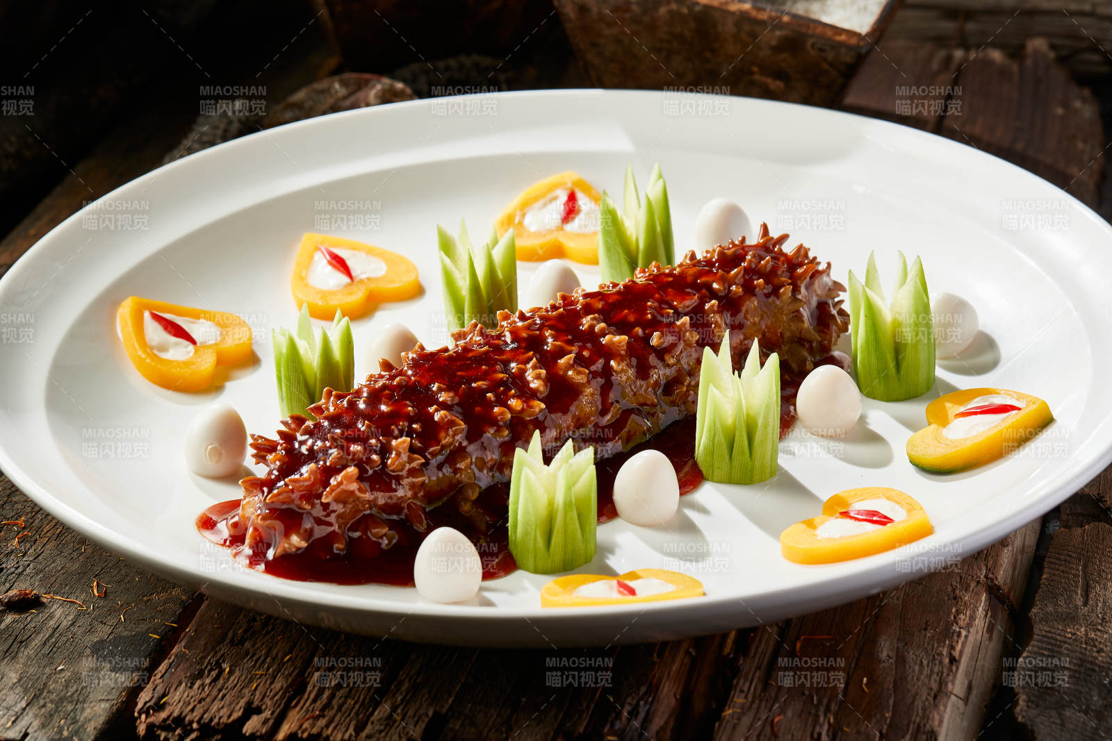 浇汁红烧寿桃梅花参图片