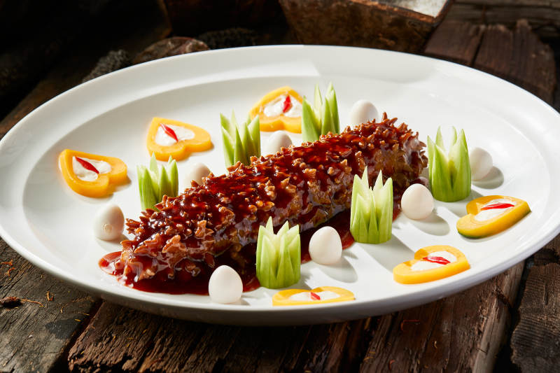 浇汁红烧寿桃梅花参图片