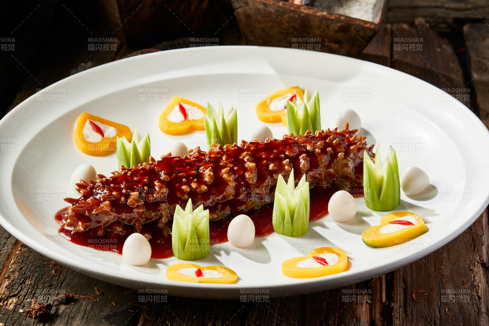 浇汁红烧寿桃梅花参图片