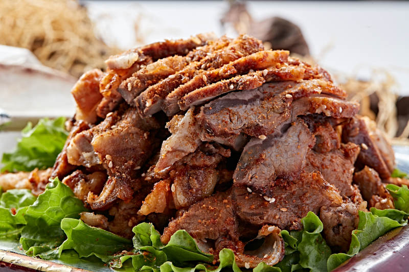 蒙餐炭烤羊腿肉图片