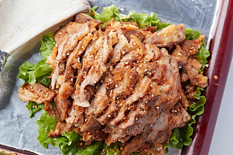 蒙餐炭烤羊腿肉图片