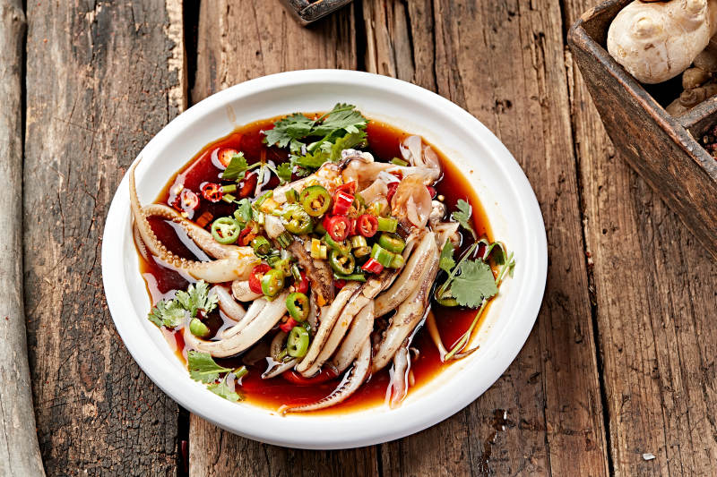 捞汁生腌鱿鱼须图片