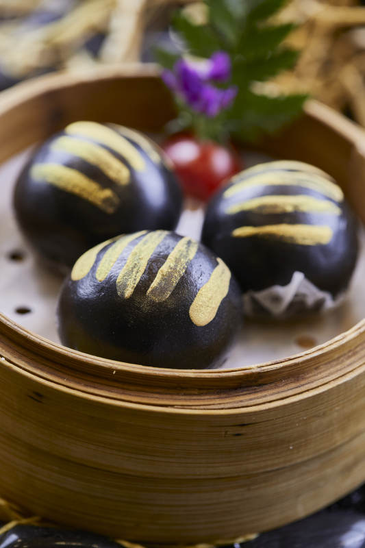 港式茶餐黑米摸金流沙包图片