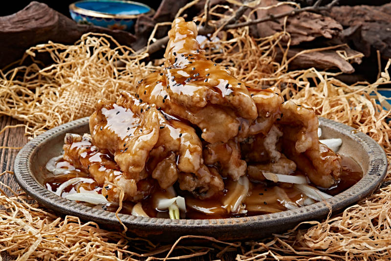 铁板浇汁脱骨带鱼图片