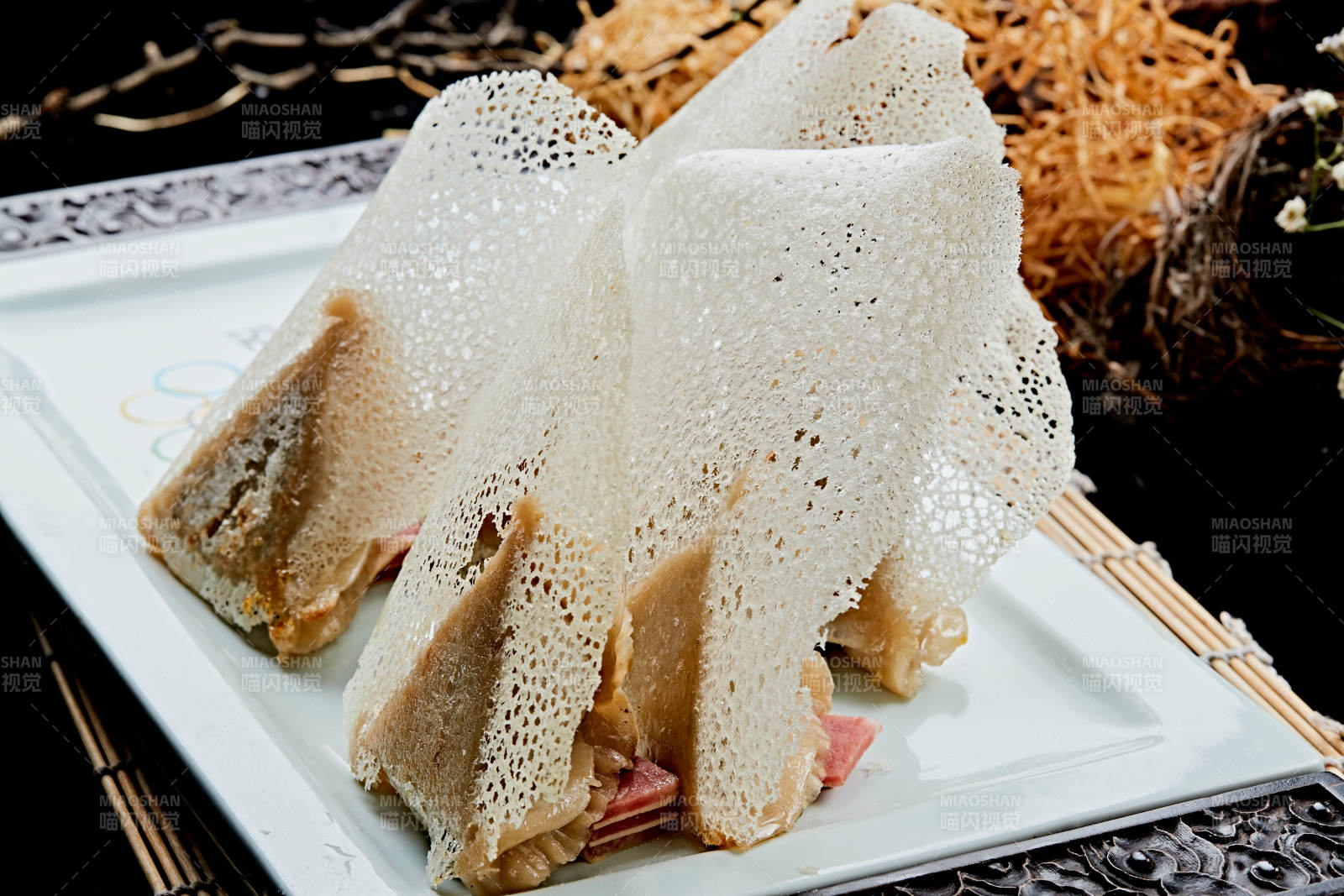 雪花渔网水煎包图片