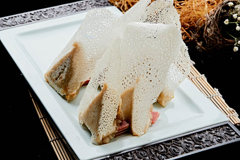 雪花渔网水煎包图片