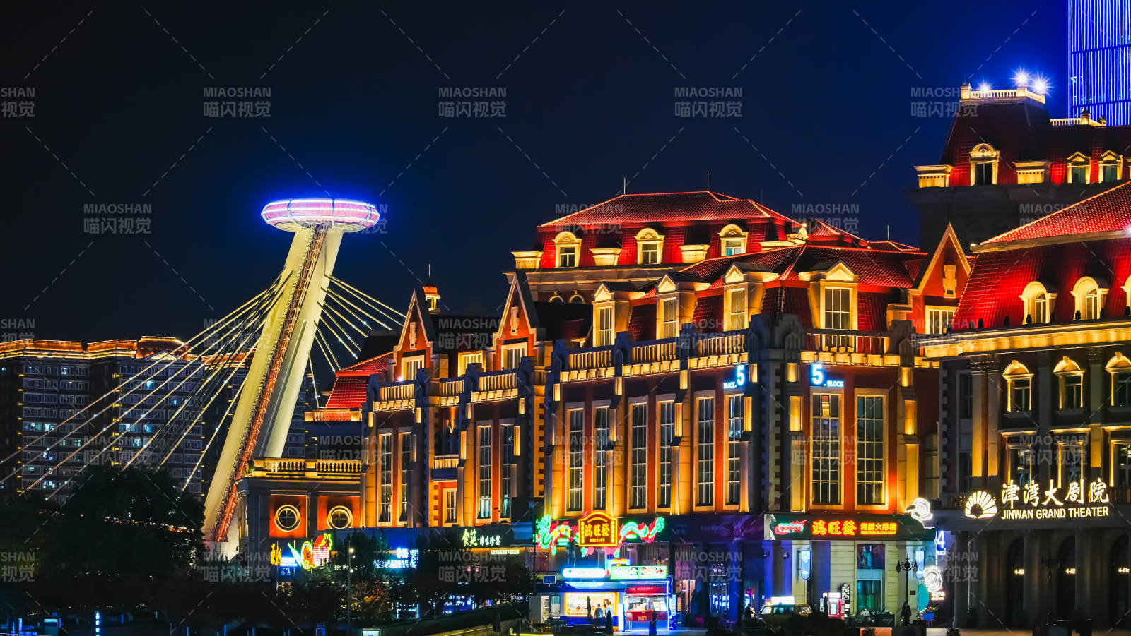 天津夜景摩天轮与建筑图片