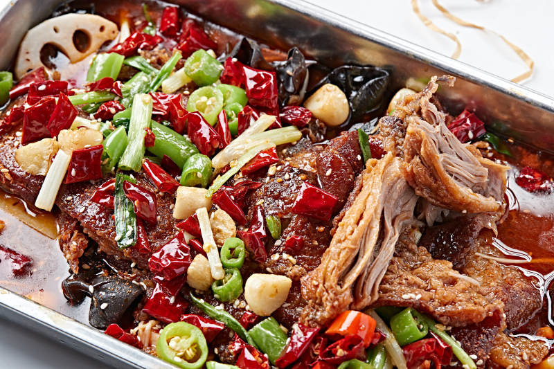 川香麻辣红油烤猪肘图片