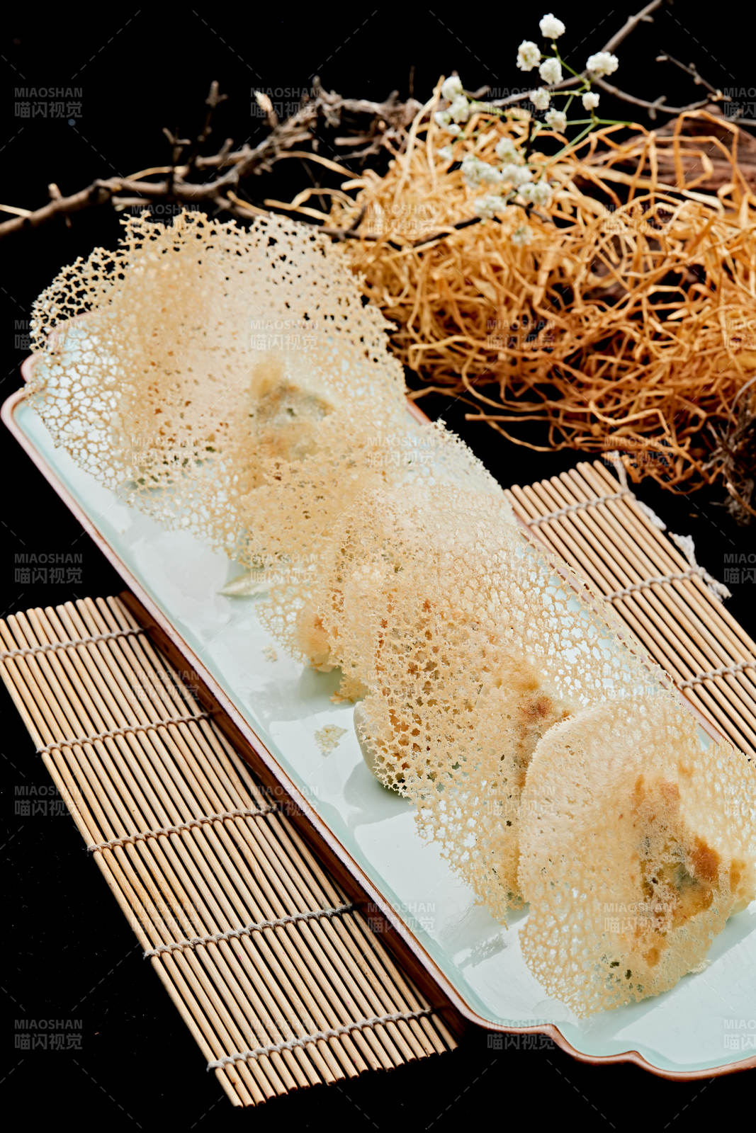 雪花渔网水煎包图片