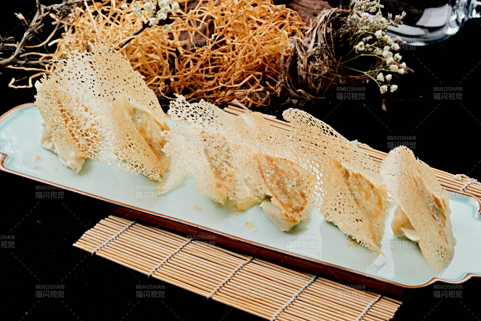 雪花渔网水煎包图片