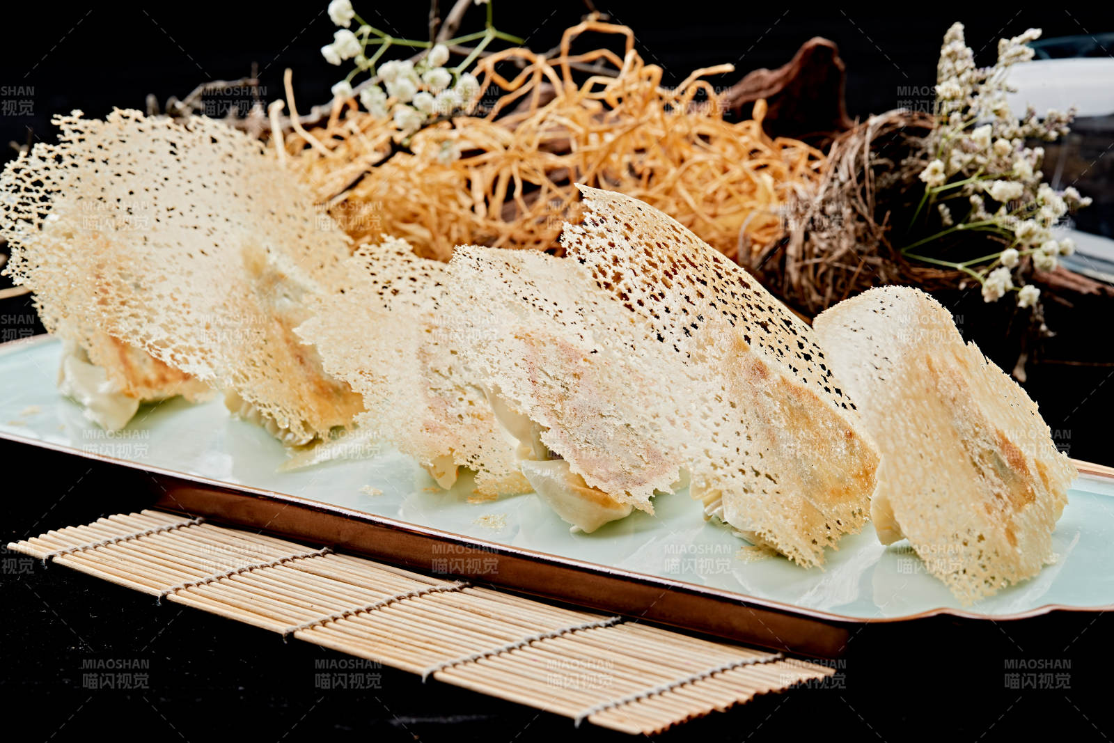 雪花渔网水煎包图片