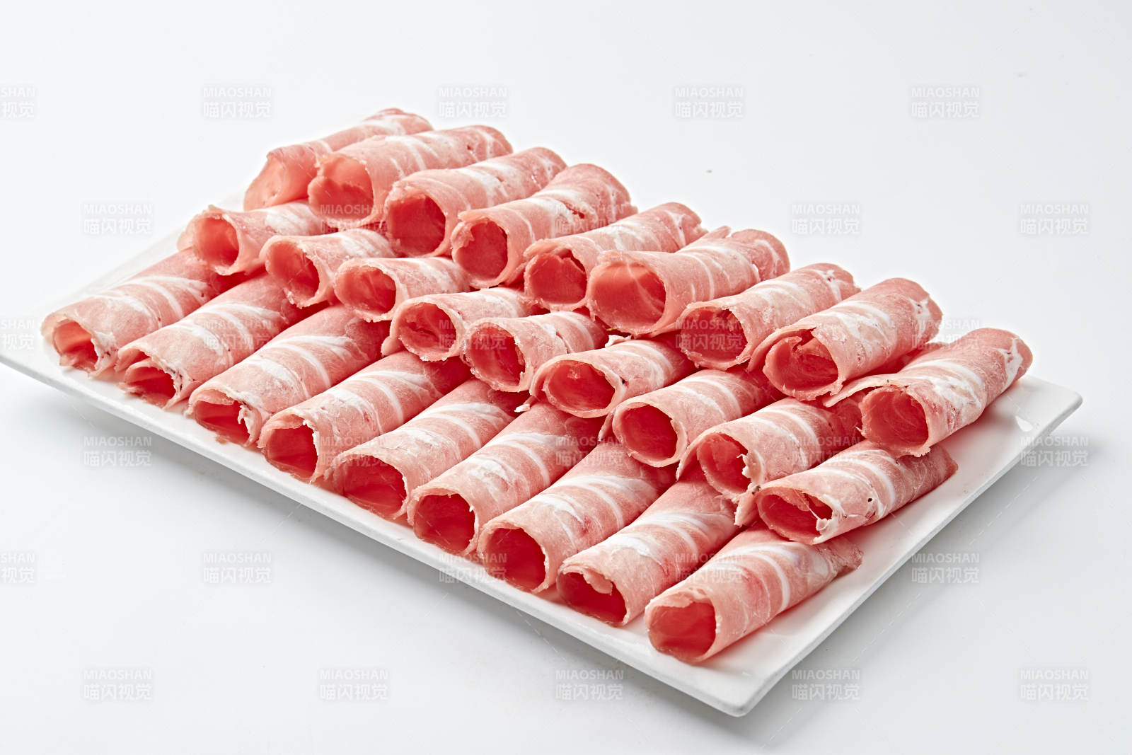 草原肥羊肉卷切片图片