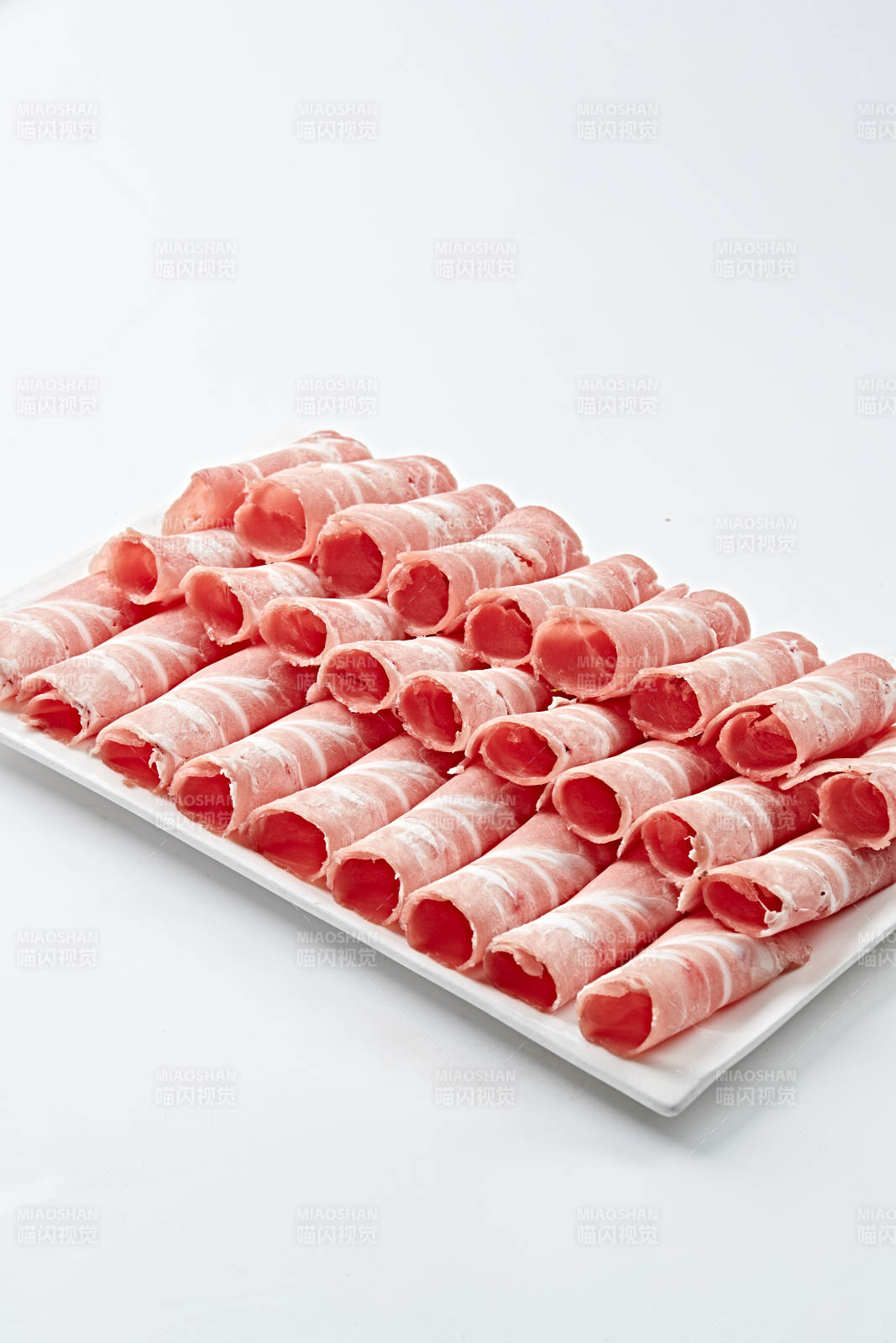 草原肥羊肉卷切片图片