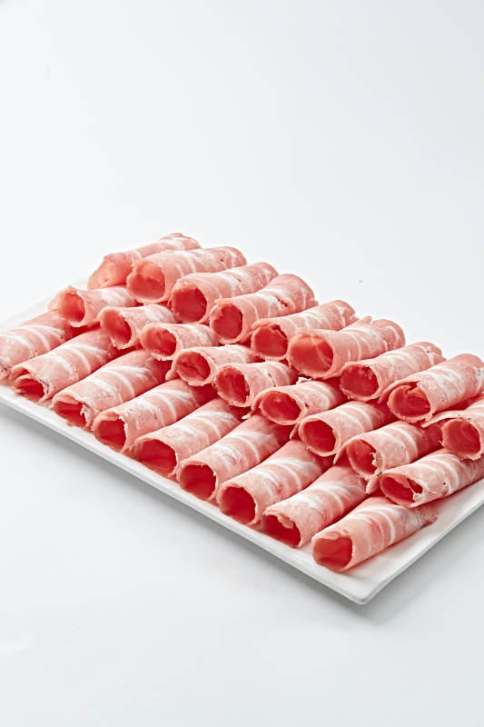 草原肥羊肉卷切片图片