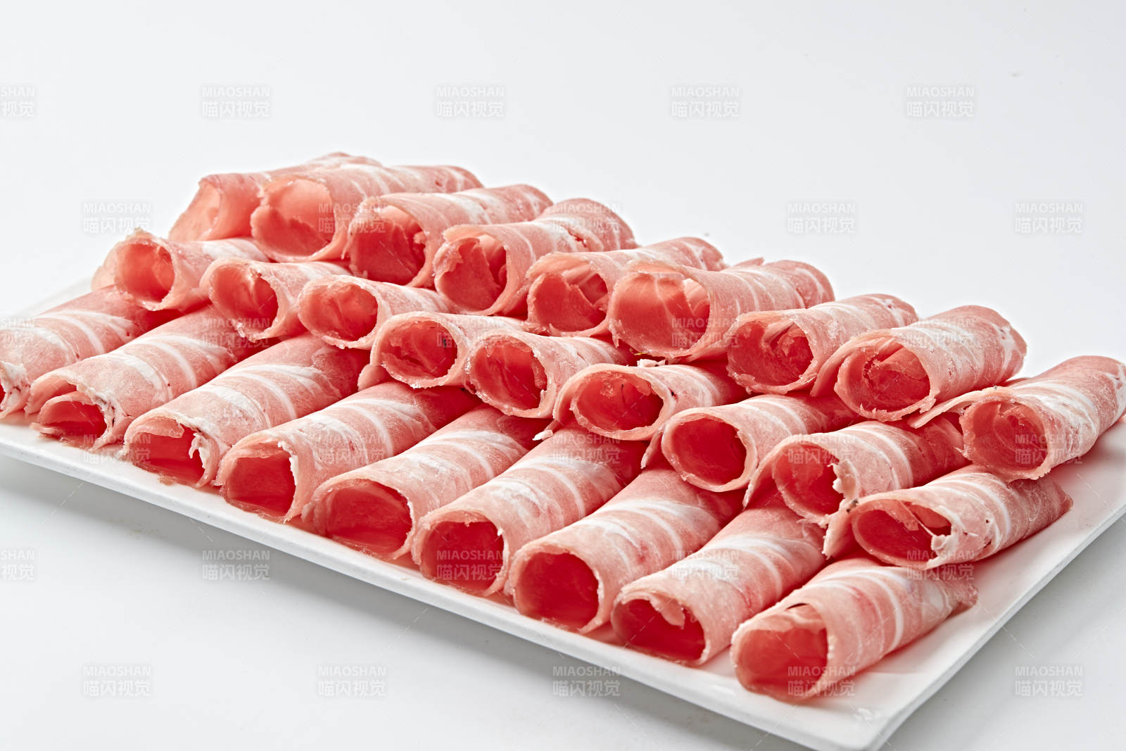 草原肥羊肉卷切片图片