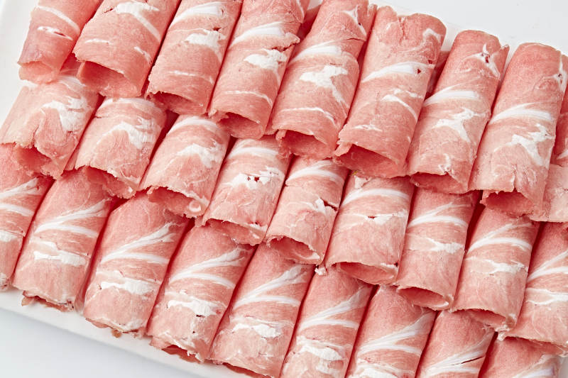 草原肥羊肉卷切片图片