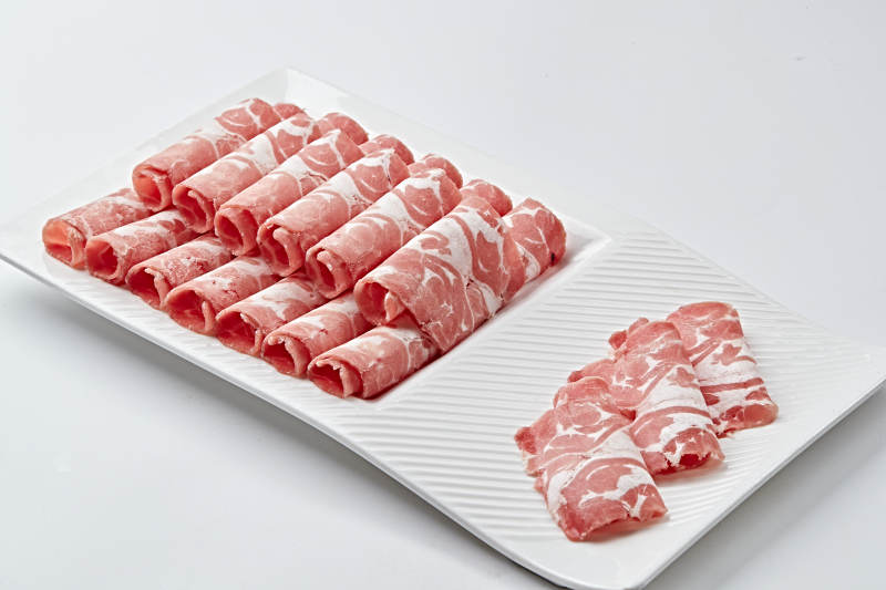 草原肥羊肉卷切片图片