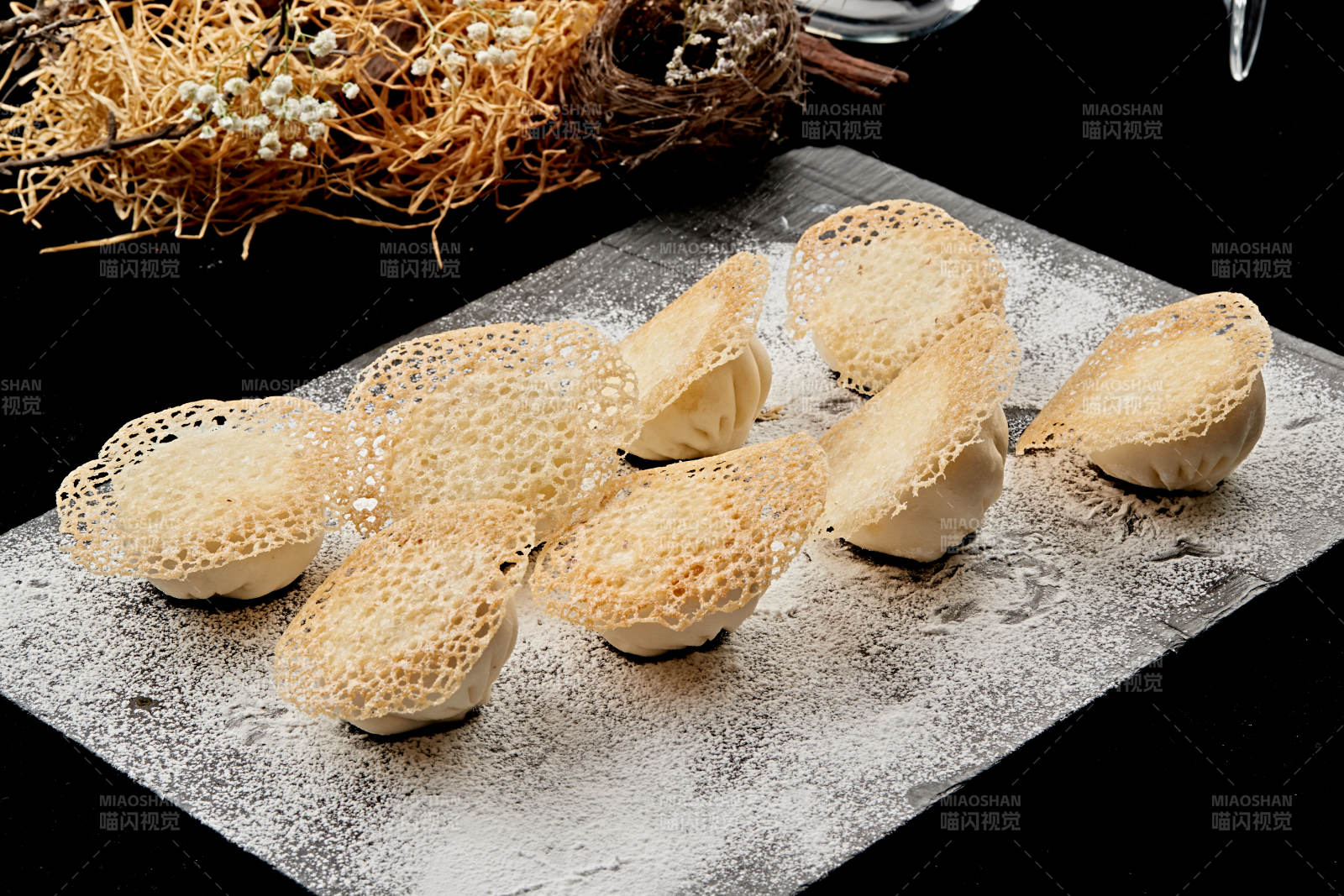 雪花渔网水煎包图片